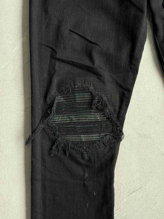 Amiri Distressed Skinny Jeans