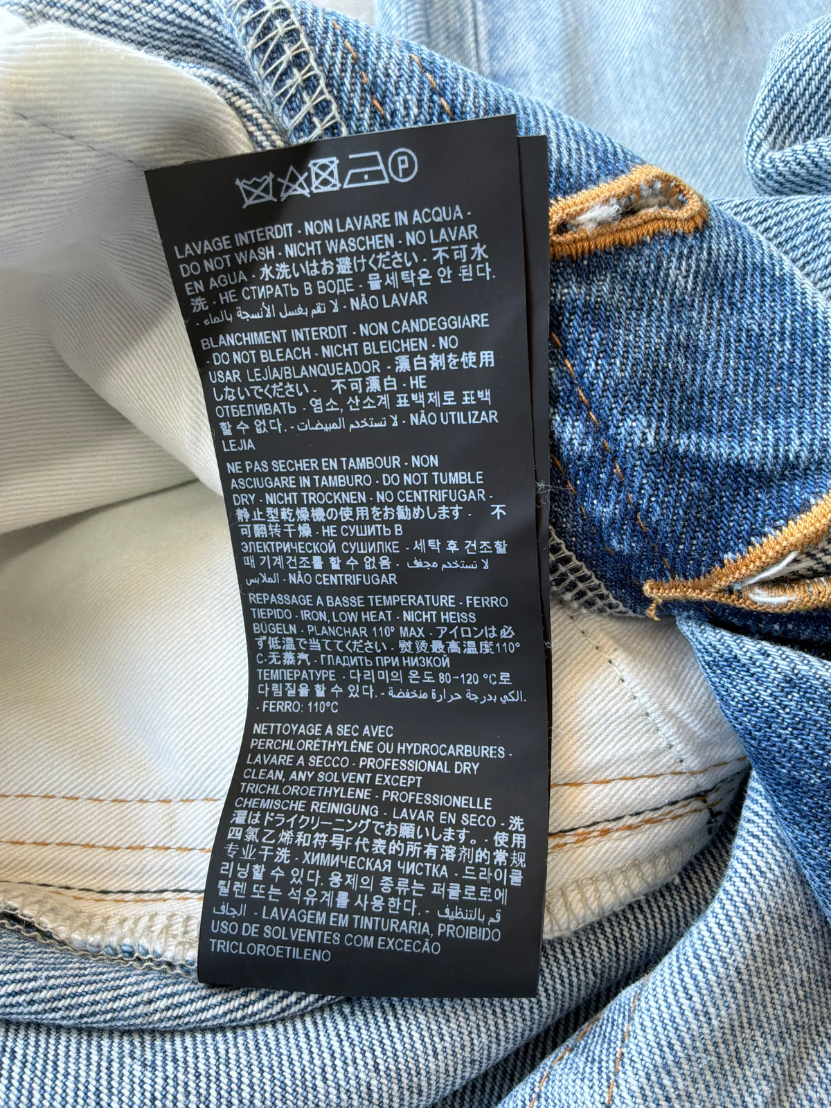 Saint Laurent Paris Distressed Light Wash Denim Pants