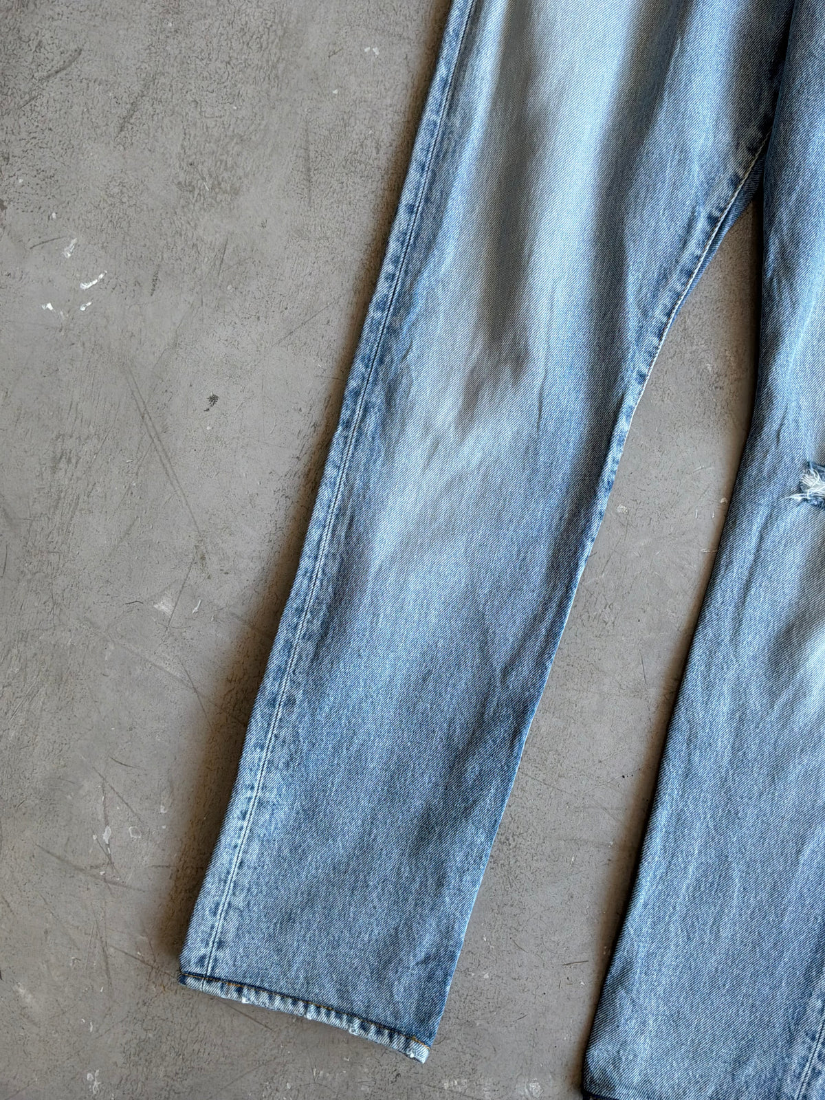 Saint Laurent Paris Distressed Light Wash Denim Pants