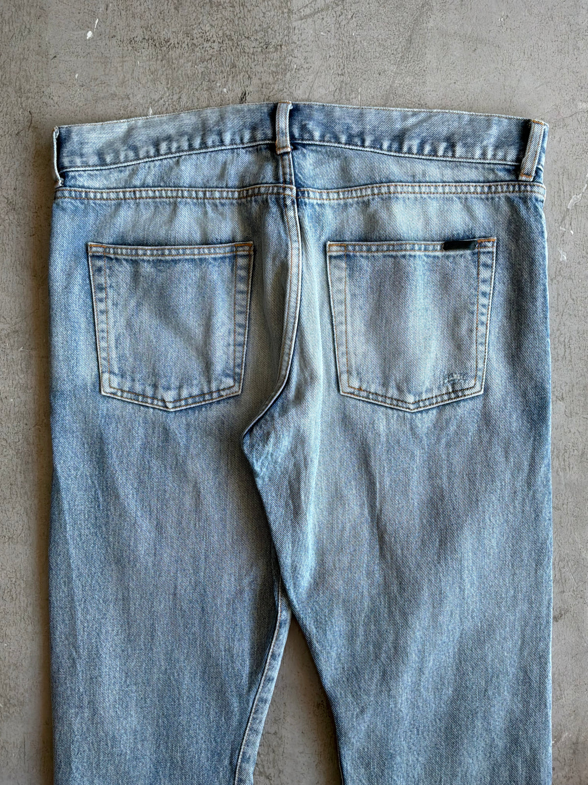 Saint Laurent Paris Distressed Light Wash Denim Pants