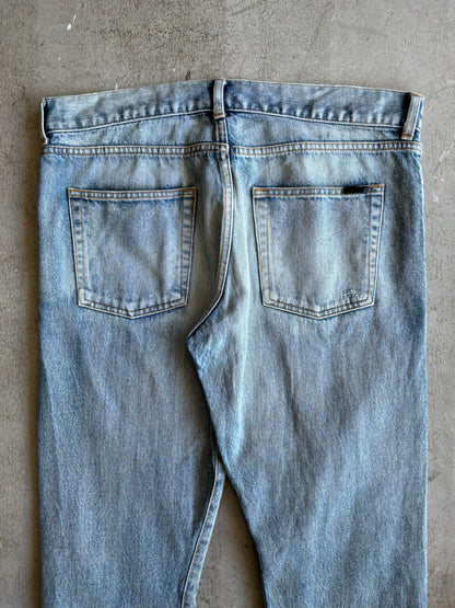Saint Laurent Paris Distressed Light Wash Denim Pants