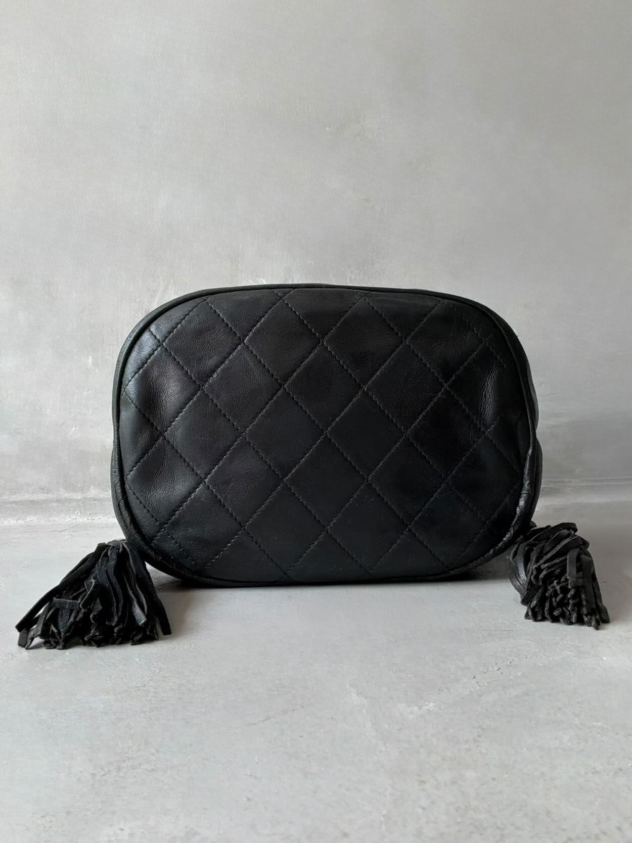 Chanel Quilted Drawstring Mini Bucket Bag