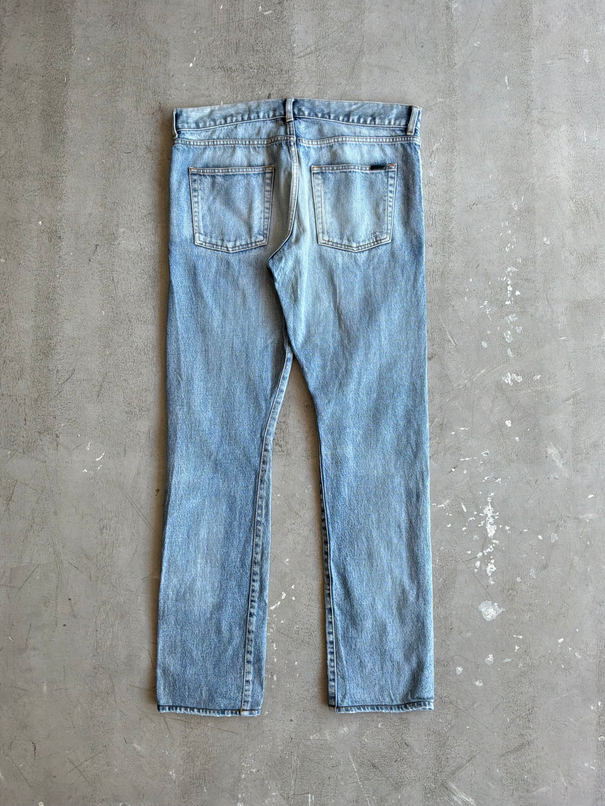 Saint Laurent Paris Distressed Light Wash Denim Pants