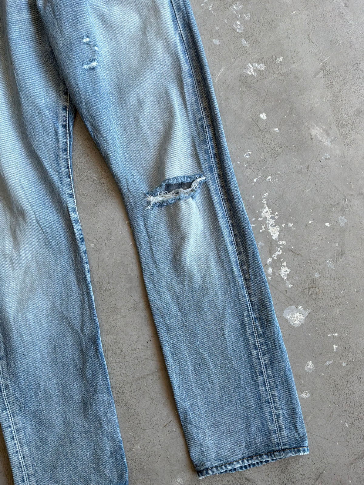 Saint Laurent Paris Distressed Light Wash Denim Pants