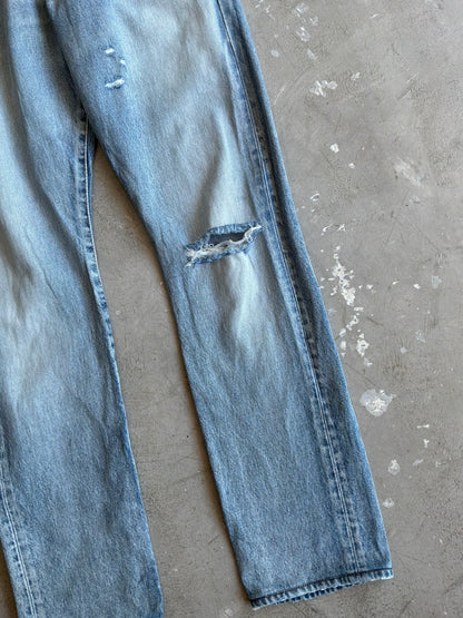 Saint Laurent Paris Distressed Light Wash Denim Pants