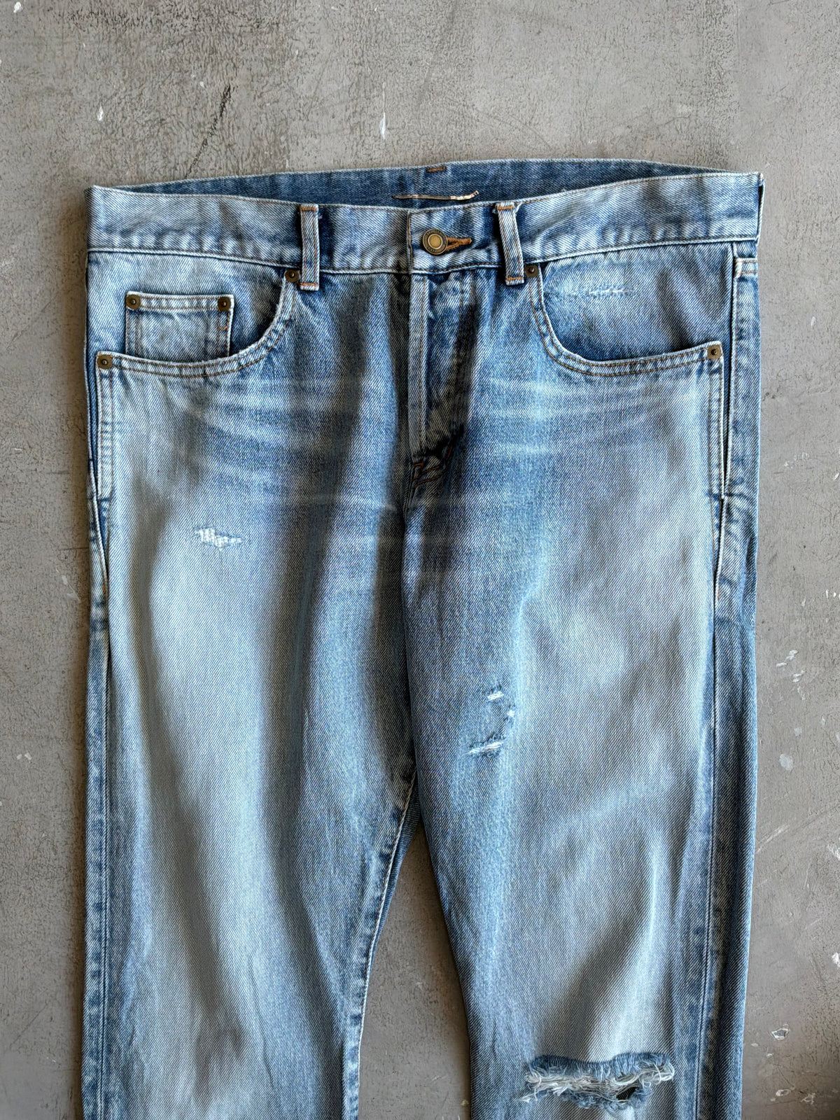 Saint Laurent Paris Distressed Light Wash Denim Pants