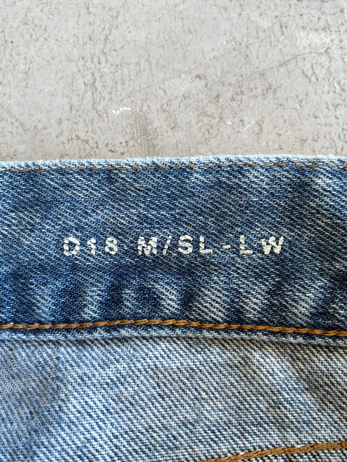 Saint Laurent Paris Distressed Light Wash Denim Pants