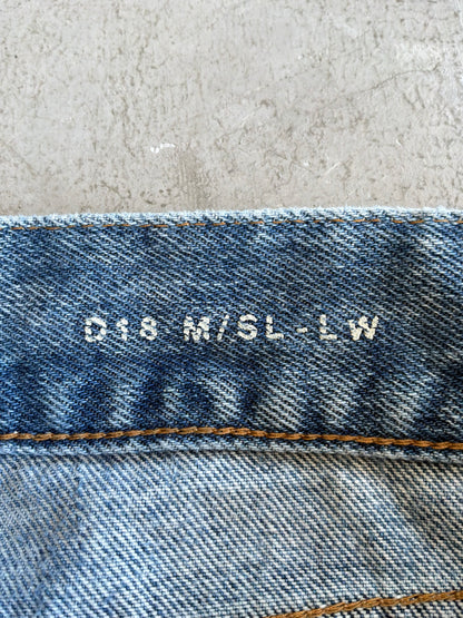 Saint Laurent Paris Distressed Light Wash Denim Pants