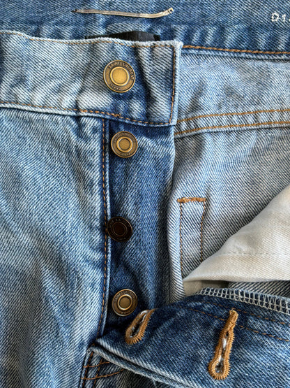 Saint Laurent Paris Distressed Light Wash Denim Pants