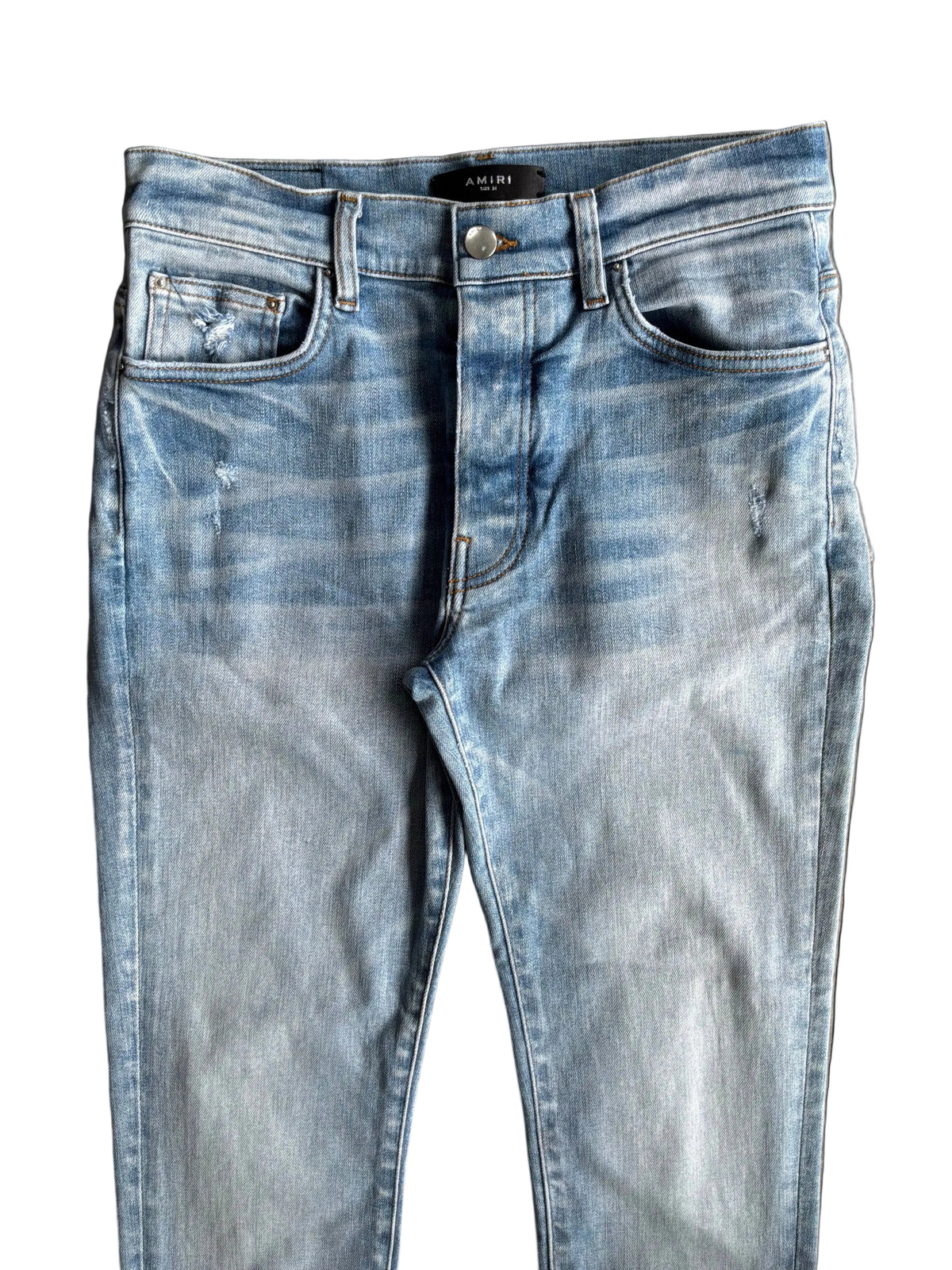 Amiri Light Washed Open Ankle Denim Pants Light blue denim jeans with a faded wash and subtle distressing.