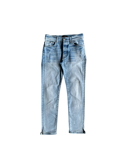 Amiri Light Washed Open Ankle Denim Pants Light blue denim jeans with a faded wash and subtle distressed details