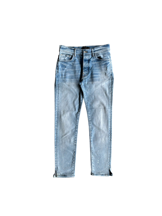 Amiri Light Washed Open Ankle Denim Pants Light blue denim jeans with a faded wash and subtle distressed details