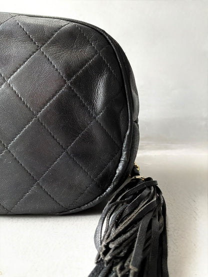 Chanel Quilted Drawstring Mini Bucket Bag