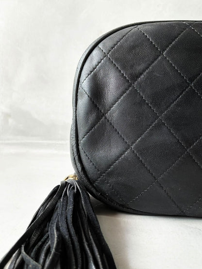 Chanel Quilted Drawstring Mini Bucket Bag