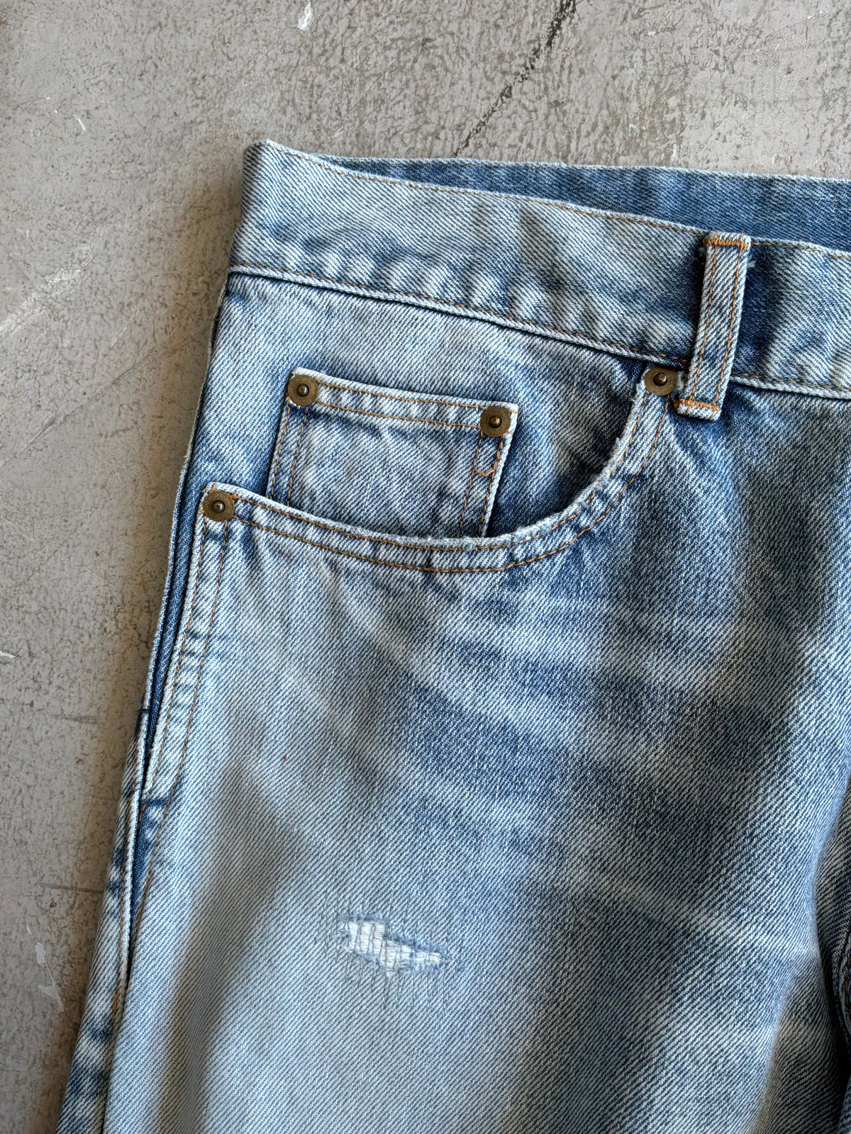 Saint Laurent Paris Distressed Light Wash Denim Pants