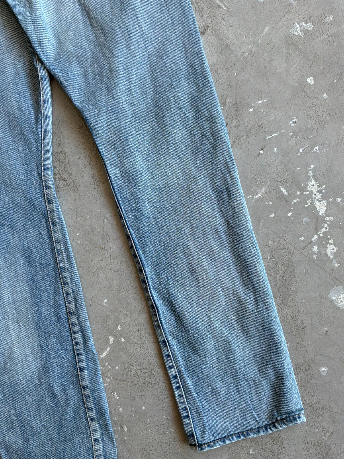 Saint Laurent Paris Distressed Light Wash Denim Pants